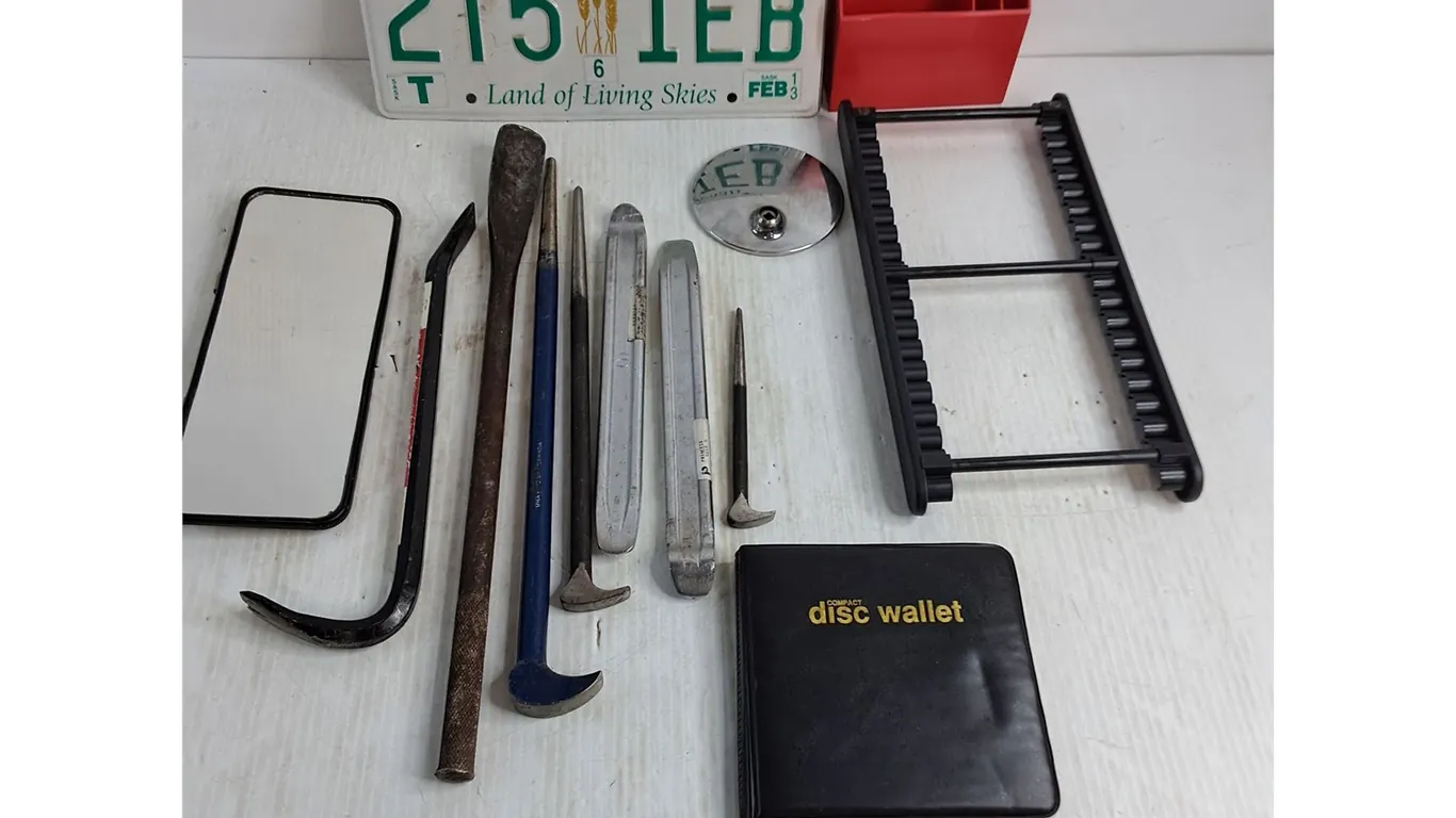 Assorted Pry Bars, Sask License Plate, Rearview Mirror, CD Wallet, Misc.