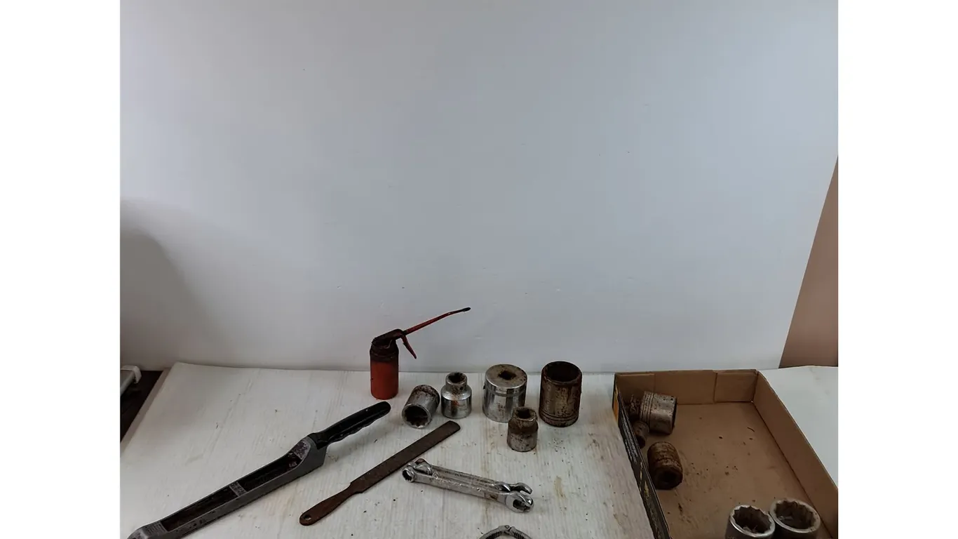 Rasp, Files, Assortment of Sockets, Oil Can, Oil Filter Wrench, (4) Small Combination Wrenches