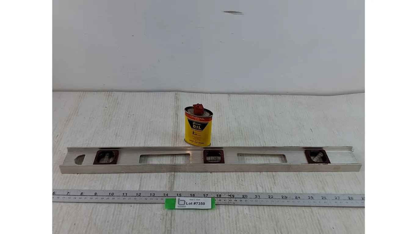 2' Level with Empty Gun Oil Bottle