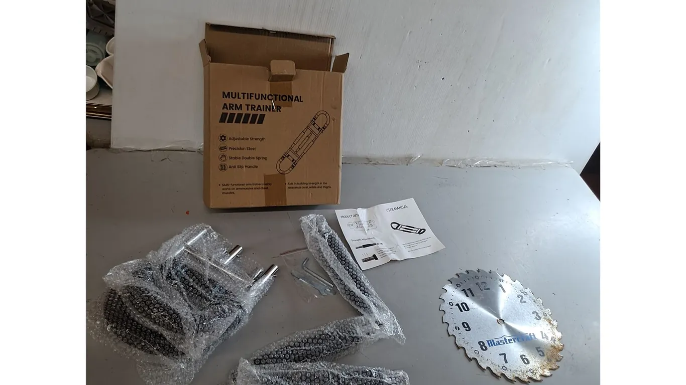 Arm Trainer- NIB & Sawblade Wall Clock 9.5"- As Is