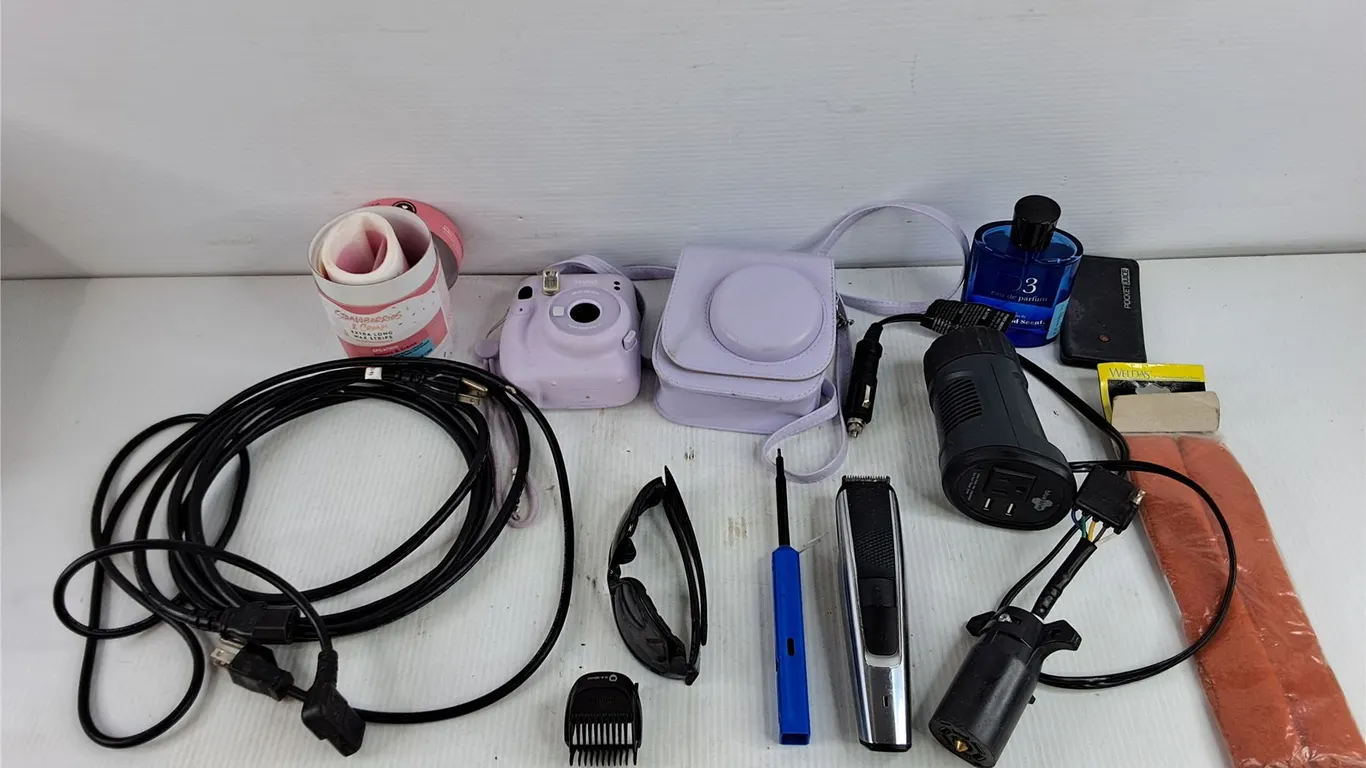 Instax Mini Camera, Sunglasses, Hair Trimmer, Extra Long Wax Strips, Power Cord, Perfume, Misc