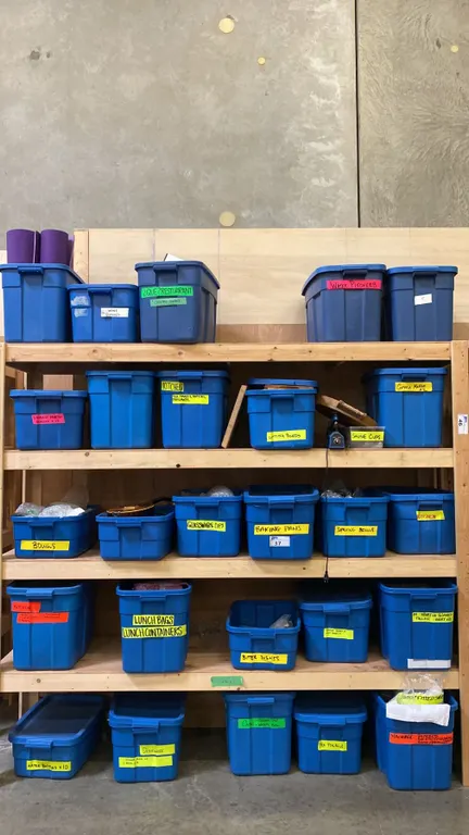 5 SHELVES OF RUBBERMAID BINS FILLED WITH ASSORTED ITEMS - INSTRUMENTS, DISHWARE, GLASSWARE,