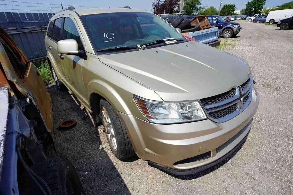 2011 Dodge Journey SN: 3D4PH6FG4BT518300
