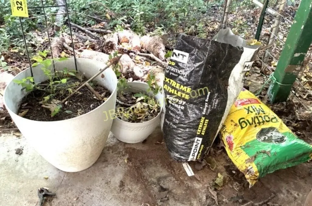 PLASTIC PLANTERS AND POTTING SOIL