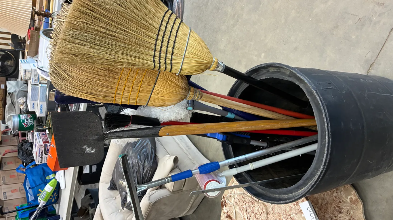 Barrel with Brooms, Shovels and Squeegees