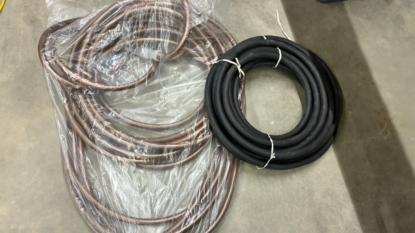 (2) Garden Hoses