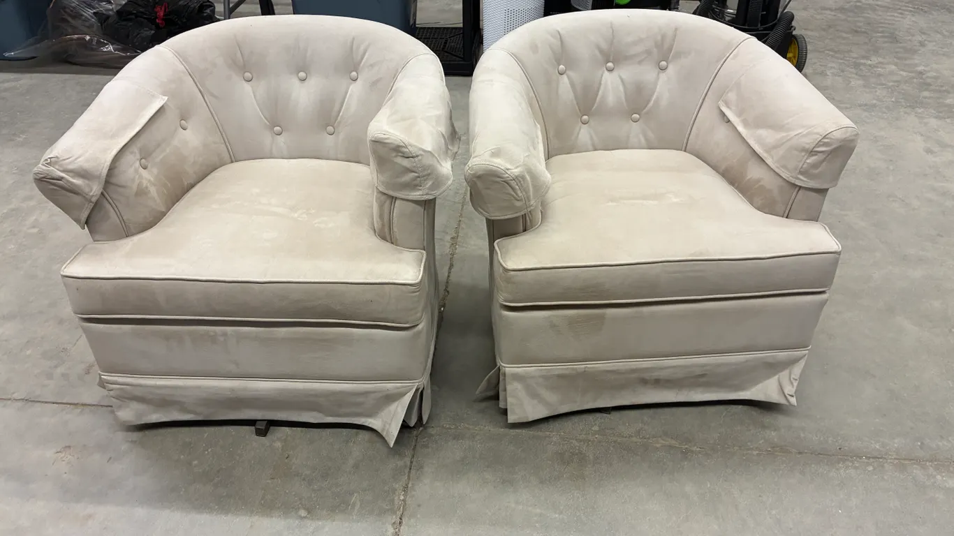 (2) Cream Swivel Rocking Chairs