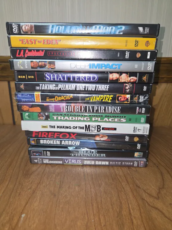 LOt of DVD INCLUDING SHATTERED, EAST OF EDEN, HOLLOW MAN, TWO, THE MAKING OF THE MOB FIREFOX
