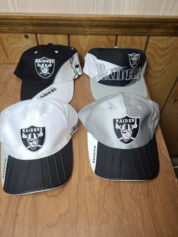 4 Oakland raiders hats