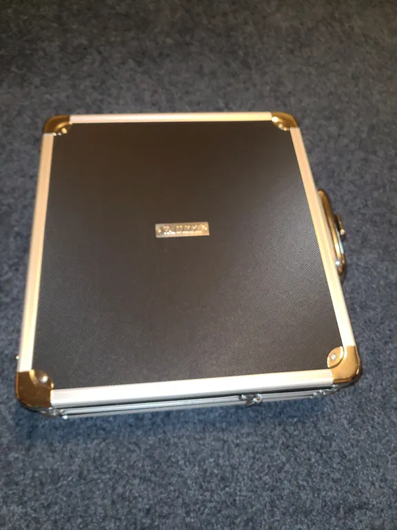 Multi media briefcase, cds, paper, dvds, photos, cards
