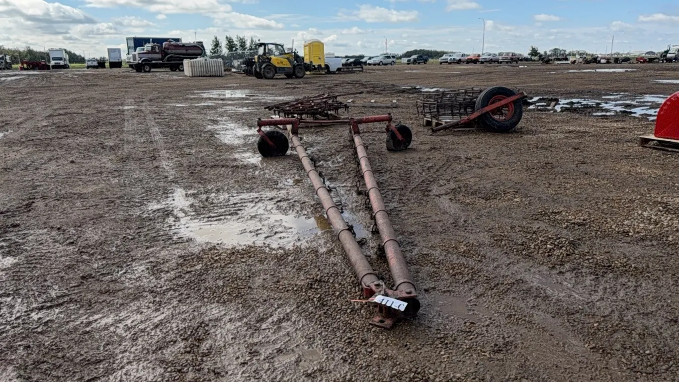 30' HARROW DRAW BAR AND 10 HARROW SECTIONS