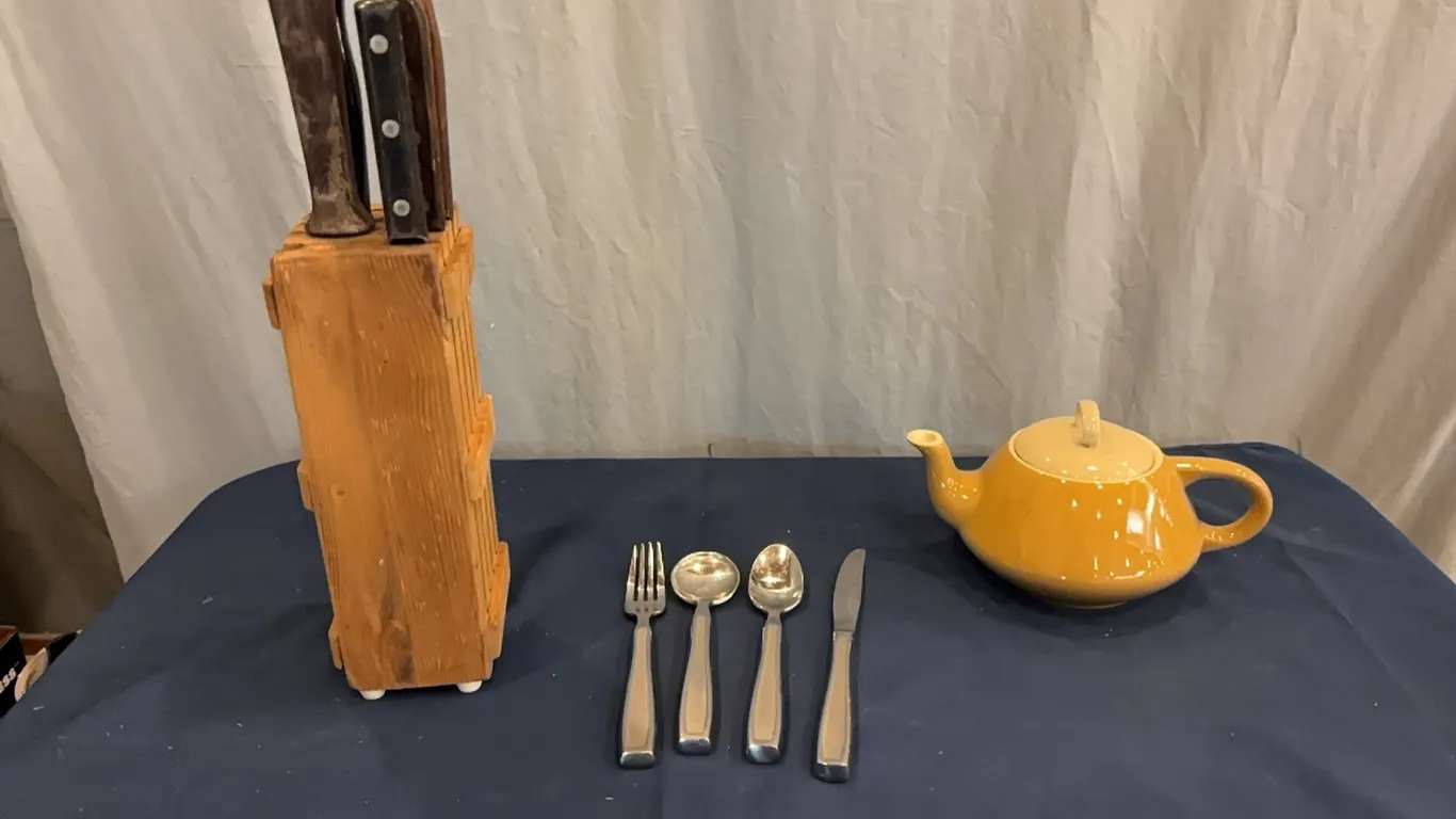 Knives, sliverware, and teapot