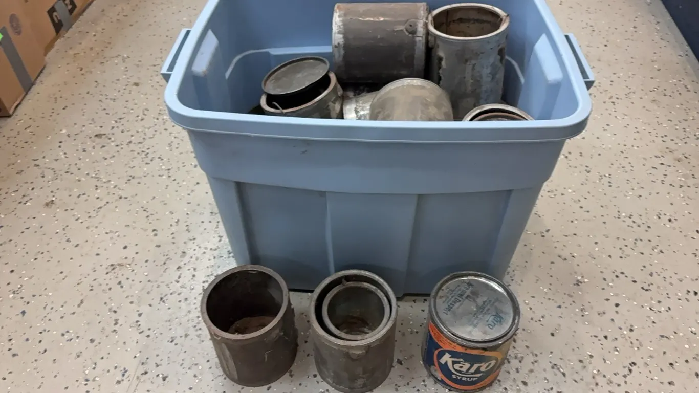 Tote of Syrup Tins