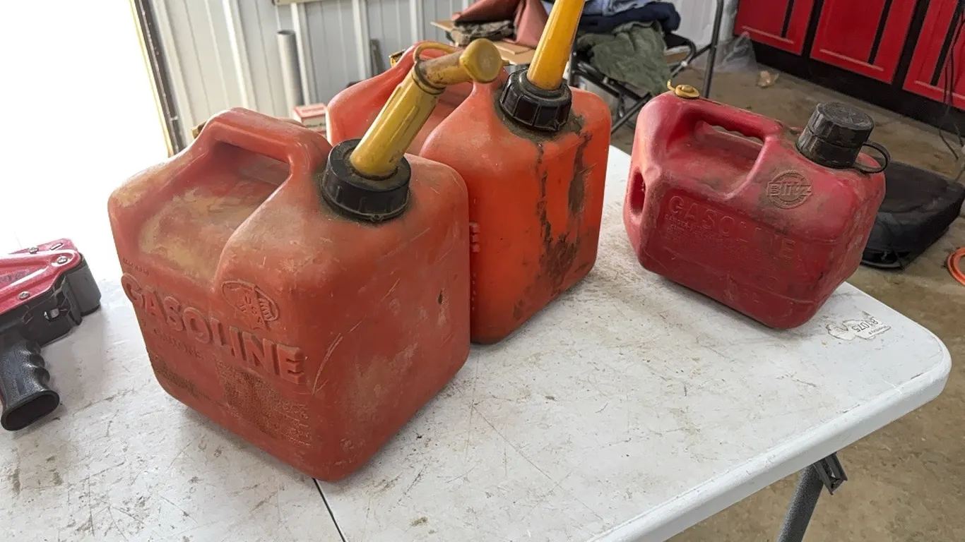 2 gallon gas cans and 1 gallon gas can