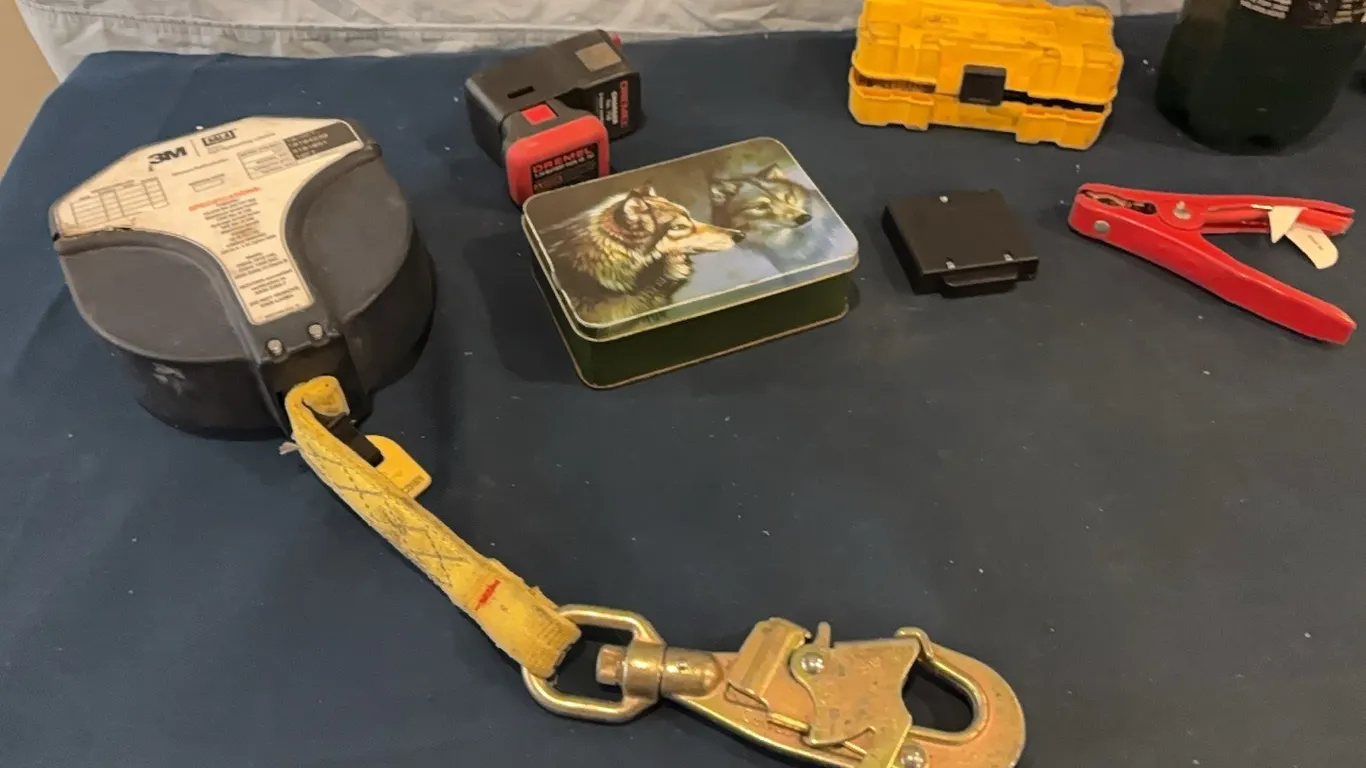 Hammer, retracting lifeline and propane tank