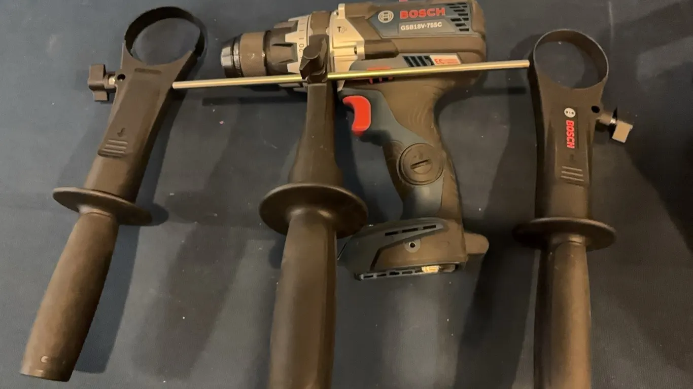 Drill, light, and auxiliary handle