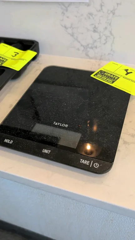 Taylor 5301335 33 lb digital portion scale. Features digital LCD display with hold, unit, and tare functions. Battery operated.