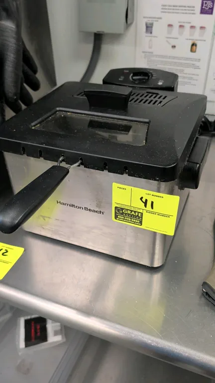 Hamilton Beach electric countertop deep fryer. Features stainless steel housing, adjustable temperature control up to 375°F, lid with viewing window,