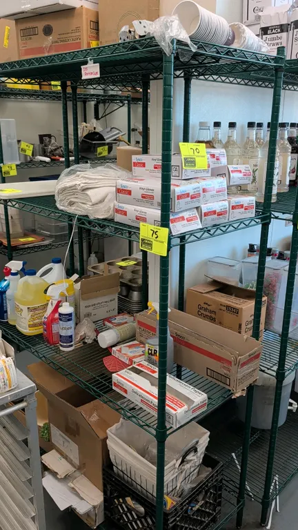 Four-tier wire shelving rack. Features green epoxy-coated construction with adjustable wire shelves. 48" x 21" x 75". Contents not included.