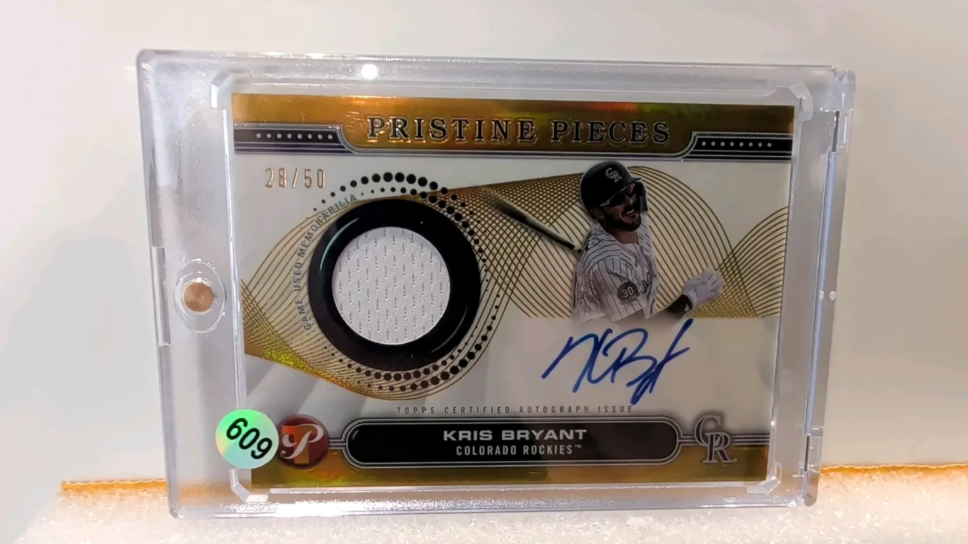A Kris Bryant Autograph Relic Card. (Topps, 2024) A 2024 Topps Pristine Baseball "Pristine Pieces" autograph relic card (PPAR-KB) featuring Colorado R
