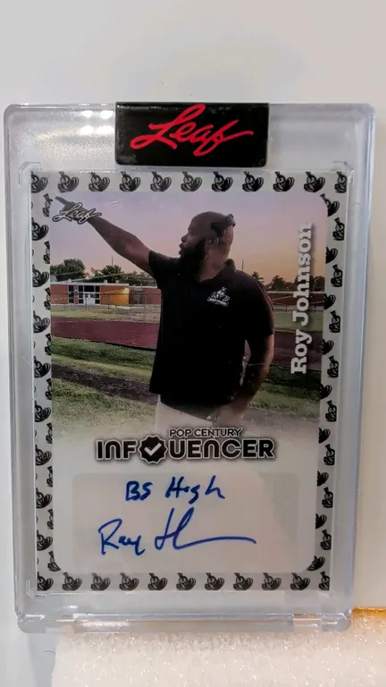 A Roy Johnson Signed "Pop Century Influencer" Trading Card. (Leaf, 2023) Card #IA-21 featuring a hand-signed signature in blue ink with "BS High" insc