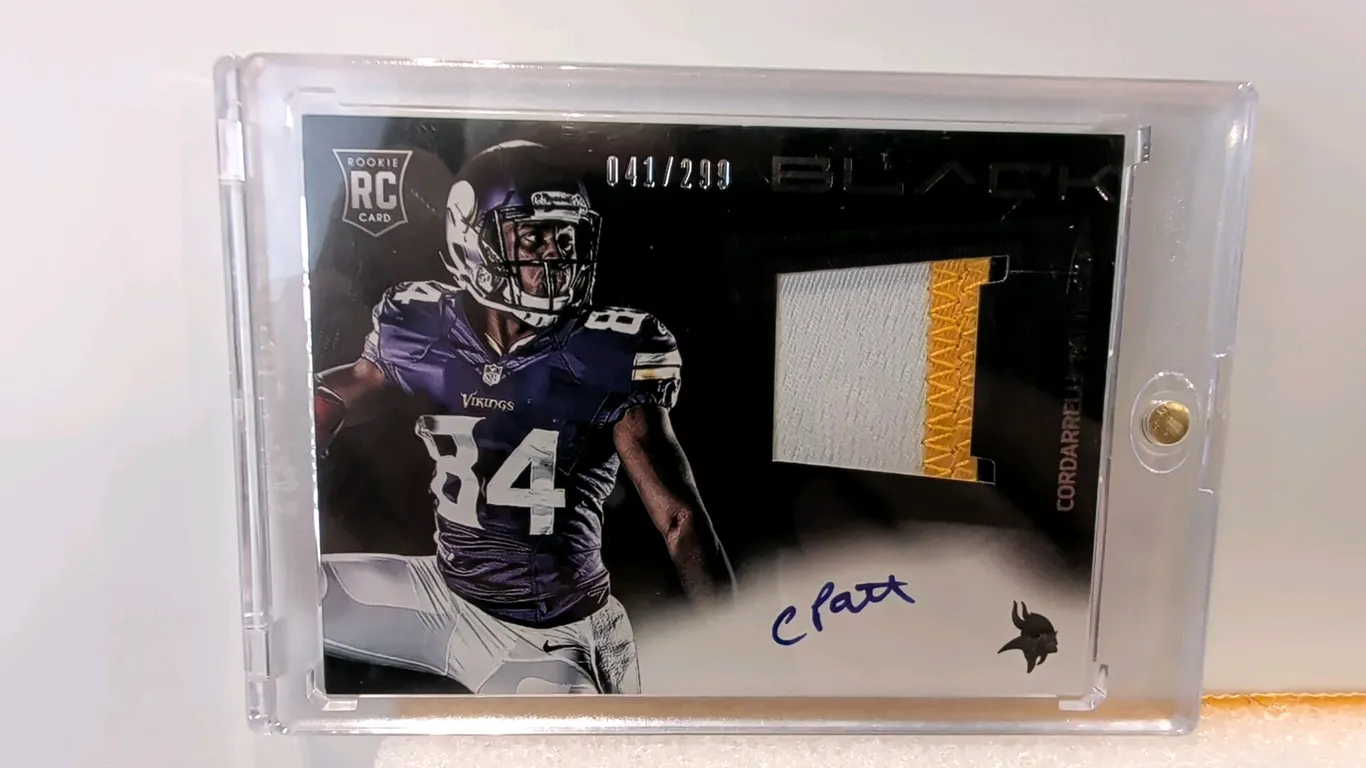 A 2013 Panini Black Football Cordarrelle Patterson Autographed Rookie Patch Card. (Panini, 2013) Card No. 204 featuring Minnesota Vikings wide receive