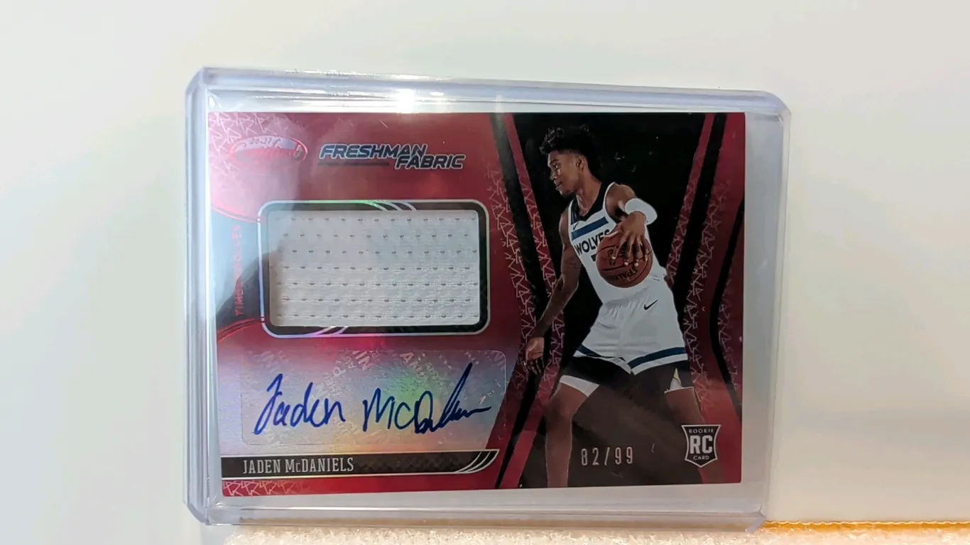 A Jaden McDaniels Panini Certified Freshman Fabric Rookie Card. (Panini, 2020-21) A 2020-21 Panini Certified Basketball Freshman Fabric rookie card (N