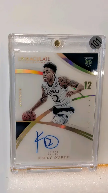 A Kelly Oubre Autographed Rookie Card. (Panini, 2015) A 2015 Panini Immaculate Collection Multi-Sport rookie card, No. 348, featuring Kelly Oubre in h