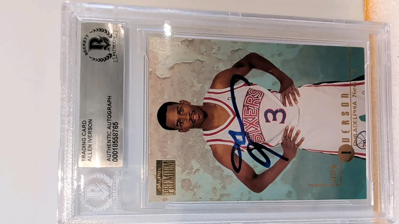 An Allen Iverson Signed 1996 SkyBox Premium #85 Trading Card. (SkyBox, 1996) Featuring an authentic autograph signed in blue ink on the front by Phila