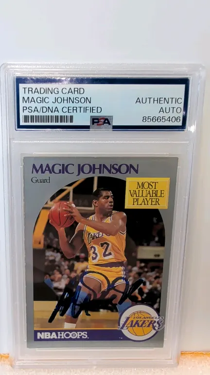 A Magic Johnson Signed 1990 NBA Hoops Trading Card. (NBA Hoops, 1990) Card #157 Most Valuable Player featuring Earvin "Magic" Johnson of the Los Angel