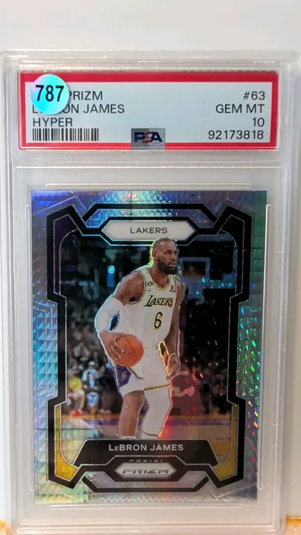 A 2023-24 Panini Prizm LeBron James #63 Hyper Prizm Basketball Card. (Panini, 2023-24) Depicting LeBron James with the Los Angeles Lakers. Graded PSA