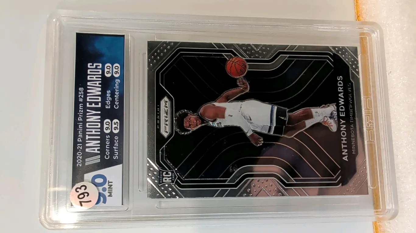 An Anthony Edwards 2020-21 Panini Prizm #258 Rookie Card. (Panini, 2020-21) Graded HGA 9.0 Mint with subgrades of Corners 9.0, Edges 9.0, Surface 9.5,