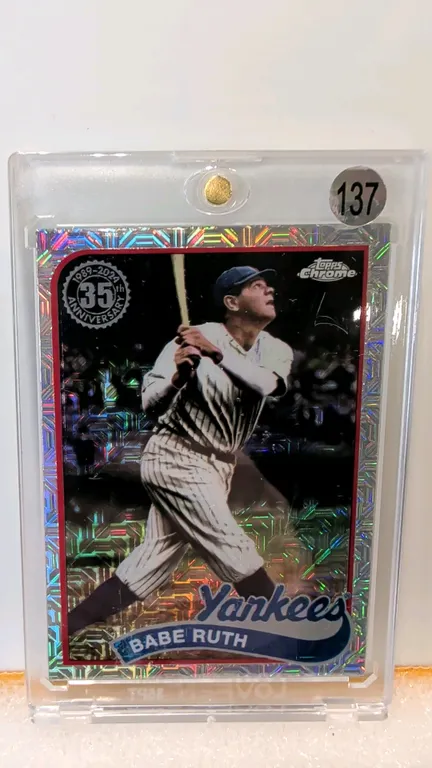 A 2024 Topps Chrome 35th Anniversary Babe Ruth Trading Card. (Topps, 2024) A 1989 Topps design tribute card featuring Babe Ruth of the New York Yankee