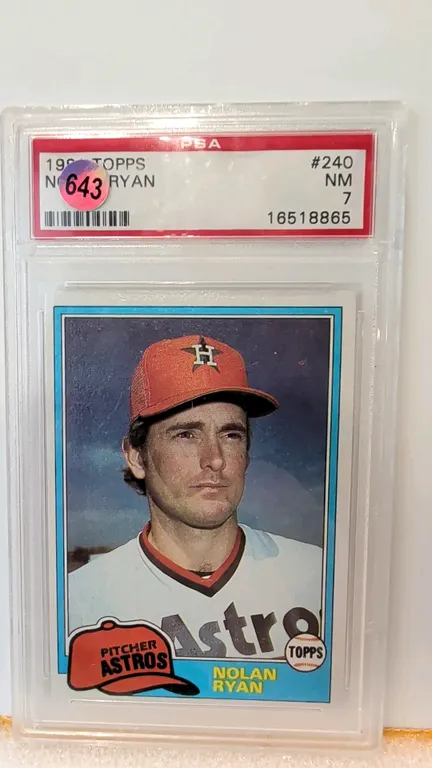 A 1981 Topps #240 Nolan Ryan Baseball Card. (Topps, 1981) Featuring Hall of Fame pitcher Nolan Ryan with the Houston Astros. Graded NM 7 by PSA (Certi