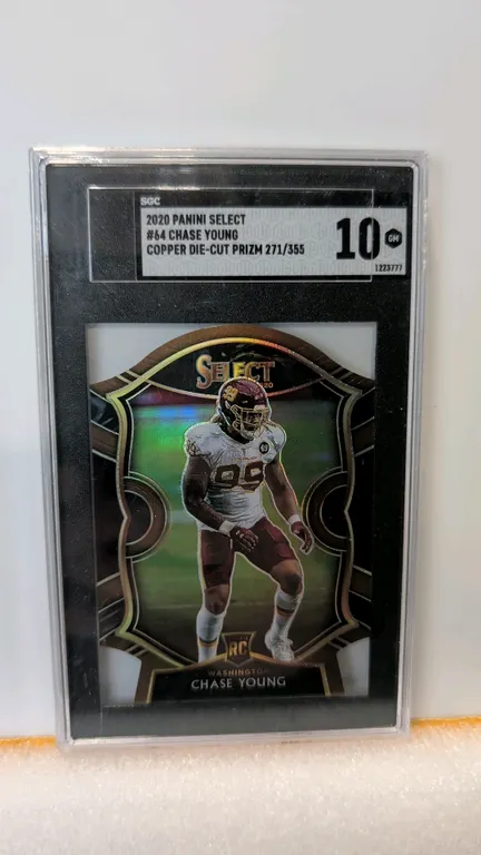 A Chase Young 2020 Panini Select Copper Die-Cut Prizm Rookie Card. (Panini, 2020) Concourse level die-cut prizm trading card #64 featuring Chase Young