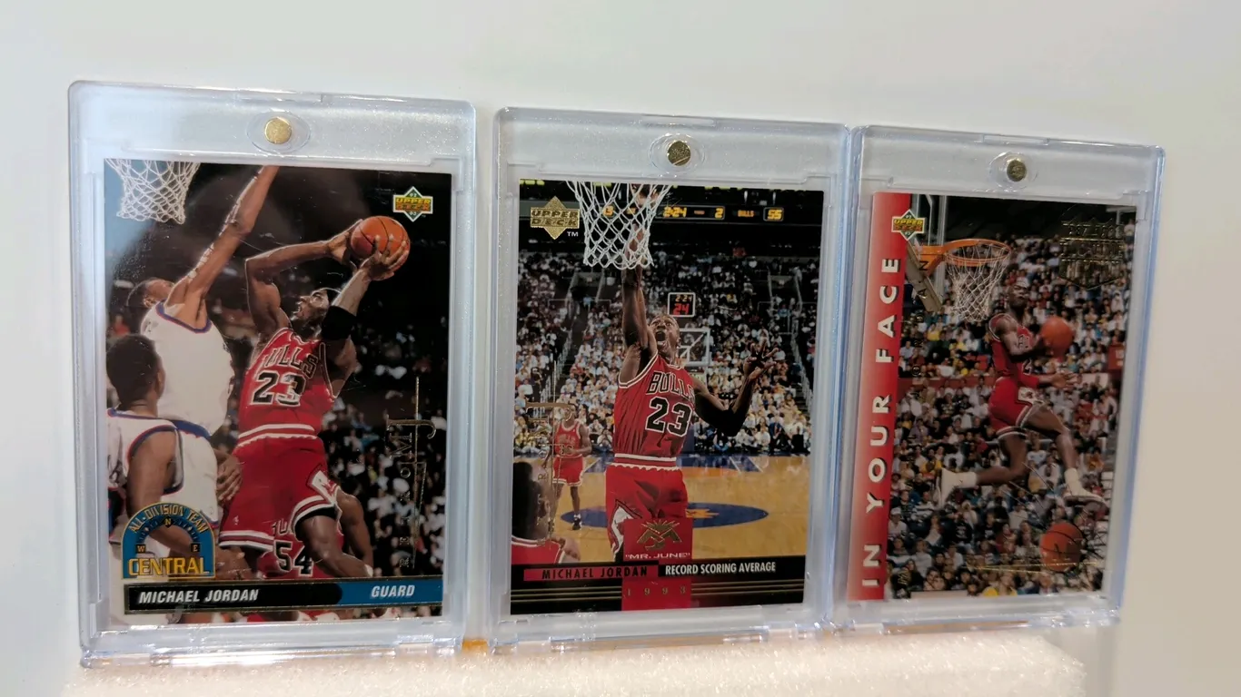A Collection of Michael Jordan Upper Deck Retro Trading Cards. (Upper Deck, 1999) A 3-card lot featuring Chicago Bulls cards #44 All-Division Team, #5