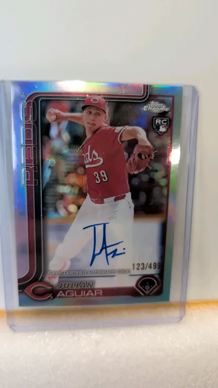 A Julian Aguiar 2025 Topps Chrome Autographed Rookie Card. (Topps, 2025) A Topps Chrome refractor rookie card #RA-JA featuring an on-card certified au