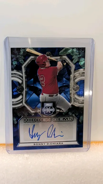 A Sonny DiChiara Autographed "Hidden Gems" Trading Card. (Panini, 2023) An Elite Extra Edition Baseball card signed in blue ink by Sonny DiChiara. Car