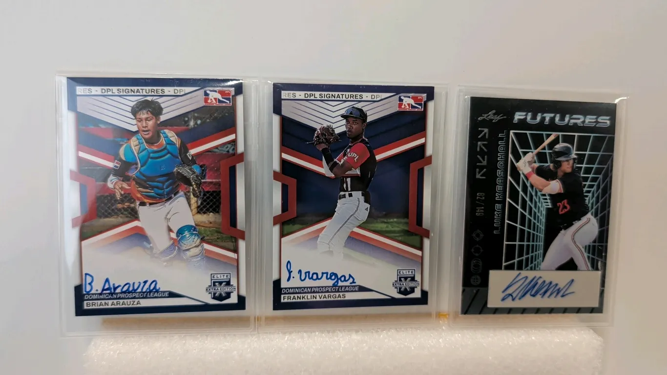 A Collection of Signed Baseball Prospect Cards. (Panini/Leaf, 2023) A set of (3) autographed prospect cards including 2023 Panini Elite Extra Edition