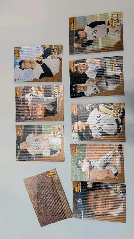 A Roger Maris "Etched in Stone" Baseball Card Set. (Ted Williams Card Company, 1994) A 9-card collection (ES1-ES9) chronicling the career highlights o