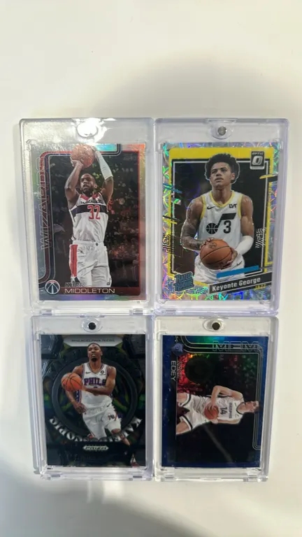 A Collection of (4) Cased NBA Basketball Cards. (Panini/Topps, 2023-2025) Includes 2024-25 Topps Khris Middleton #100, 2023-24 Donruss Optic Keyonte G