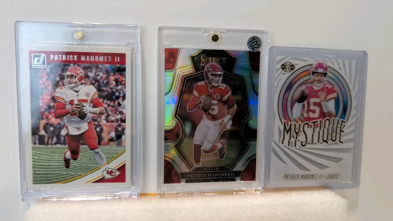 A Collection of Patrick Mahomes II Football Cards. (Panini, 2018-2022) A collection of (3) Kansas City Chiefs cards featuring Patrick Mahomes II. Incl