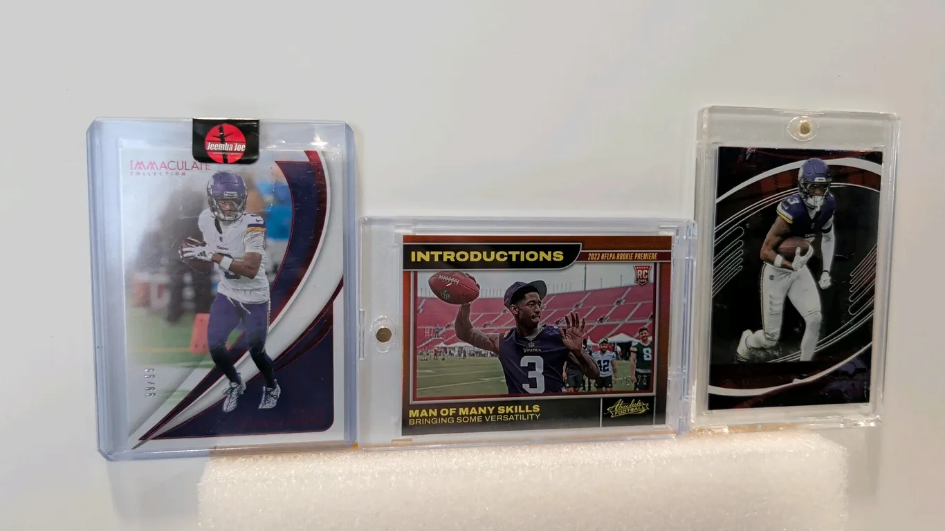 A Collection of Jordan Addison Trading Cards. (Panini, 2023-2025) A 3-card lot featuring Minnesota Vikings wide receiver Jordan Addison. Includes a 20