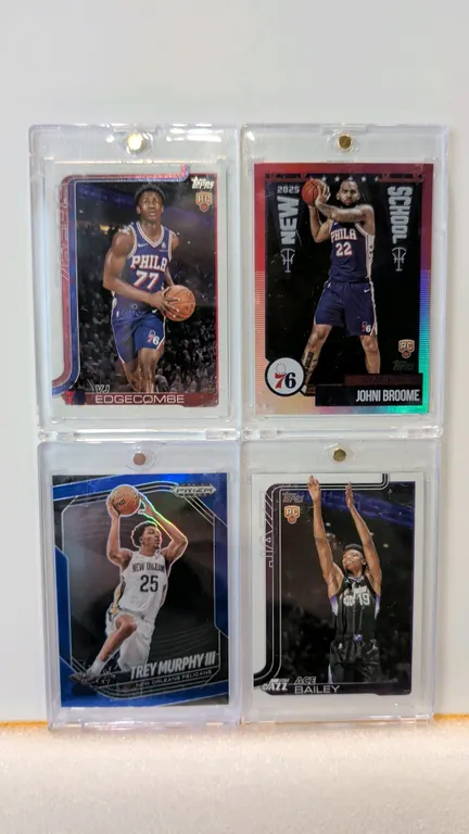 A Collection of (4) Basketball Trading Cards. (Panini/Topps, 2024-2025) Includes 2024-25 Panini Prizm Black Trey Murphy III #124 numbered 025/199, 202