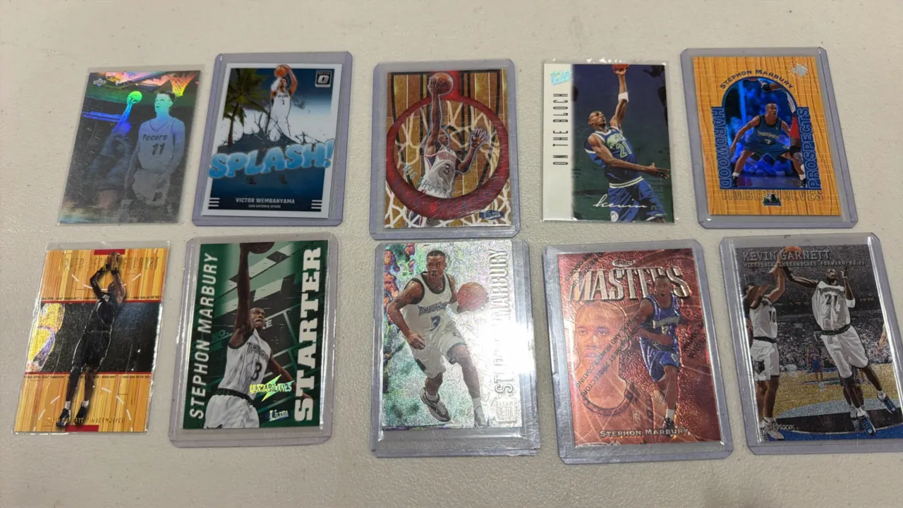 A Collection of (10) Basketball Trading Cards. (Various, 1990s-2024) Includes a 2023-24 Panini Donruss Optic Victor Wembanyama Splash insert, 1996-97