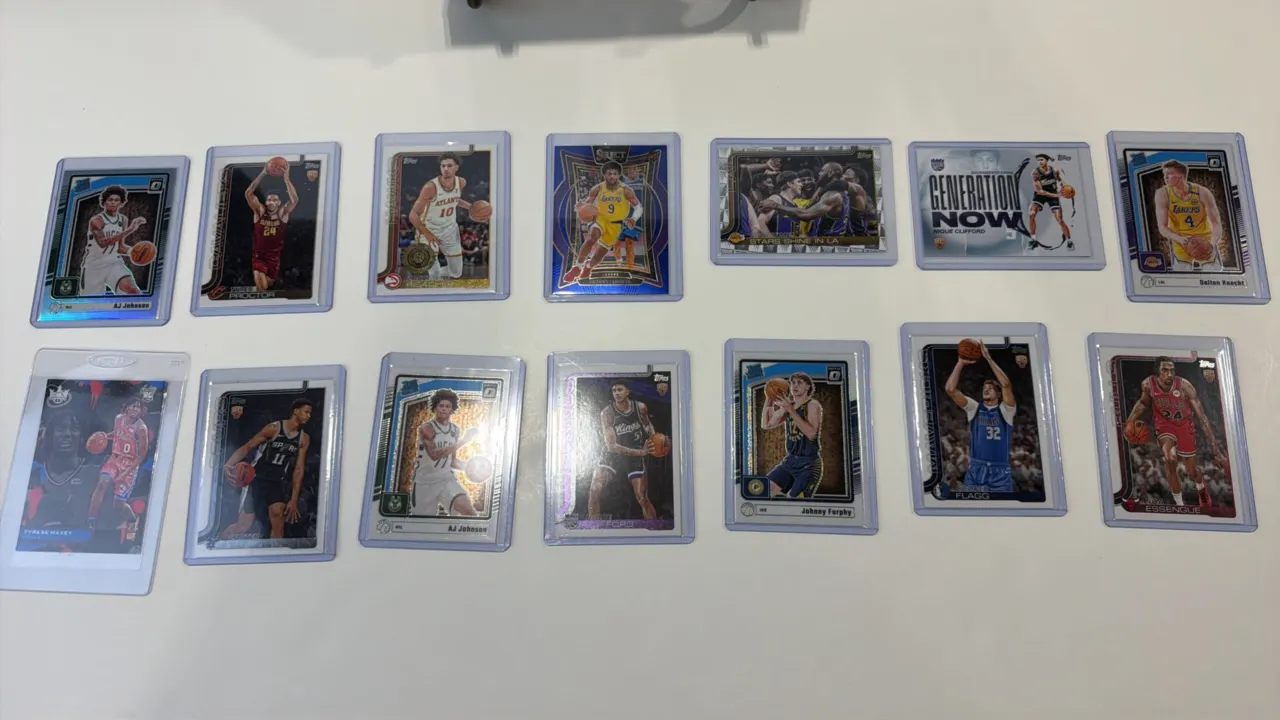 A Collection of (14) Basketball Trading Cards. (Panini/Topps, 2024-2025) Includes Panini Donruss Optic Rated Rookies, Topps Flagship, Select, and Cour
