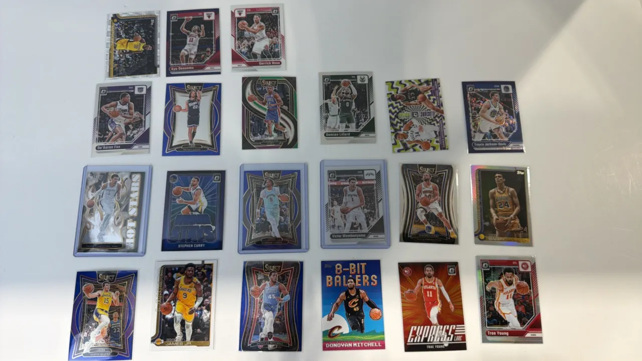 A Collection of Basketball Trading Cards. (Panini/Topps, 2023-2025) An assorted lot of 19 modern basketball cards featuring Victor Wembanyama, Bronny