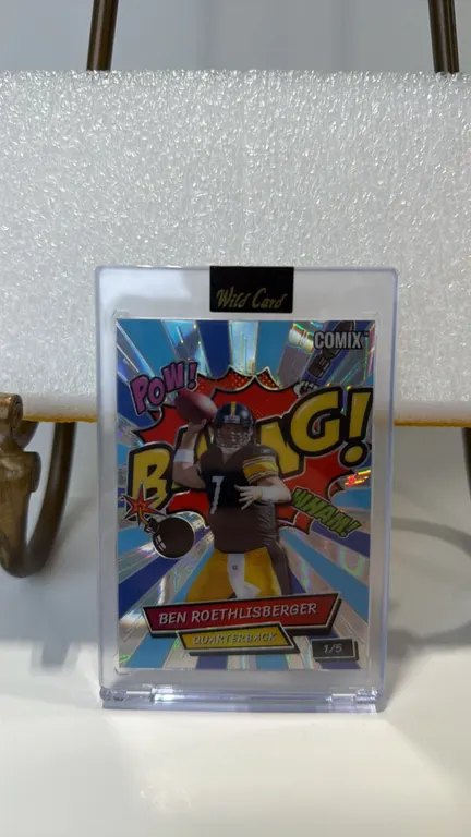 A Ben Roethlisberger Wild Card COMIX Trading Card. (Wild Card, 2023) A limited edition football trading card featuring quarterback Ben Roethlisberger