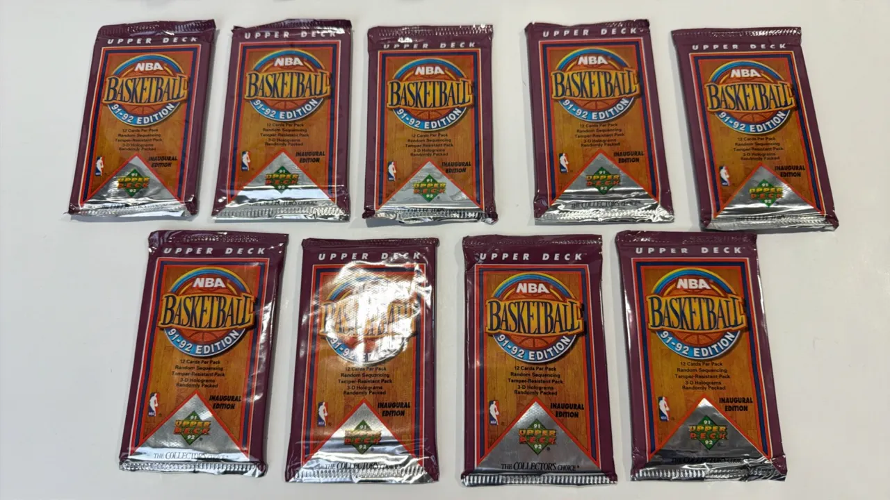 A Collection of 1991-92 Upper Deck NBA Basketball Inaugural Edition Card Packs. (Upper Deck, 1991) A group of factory-sealed foil packs containing 12