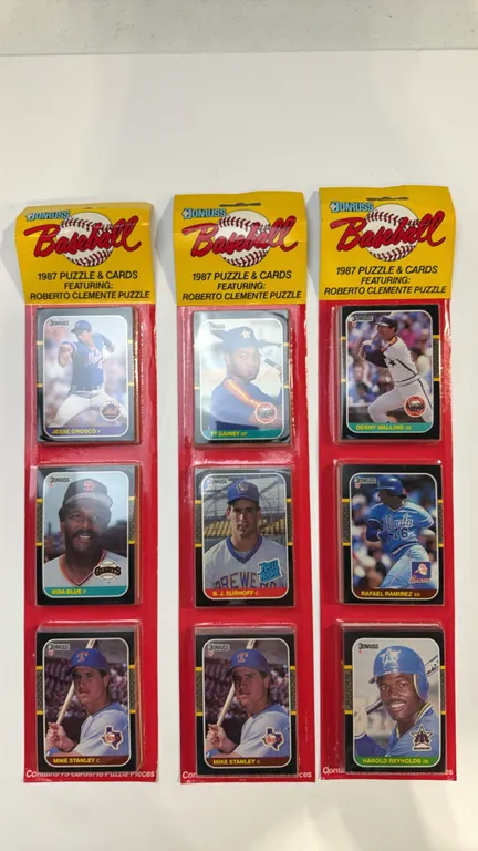 A Set of 1987 Donruss Baseball Rack Packs. (Donruss/Leaf, 1987) A collection of (3) factory-sealed rack packs featuring Roberto Clemente puzzle pieces